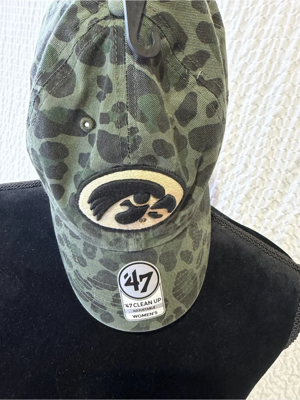 47 Women's Camo Cap with Black and Cream Hawkeye Logo